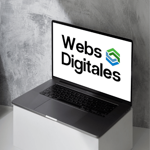 Computador apoyado con el Logo de la agencia de diseño web Webs Digitales